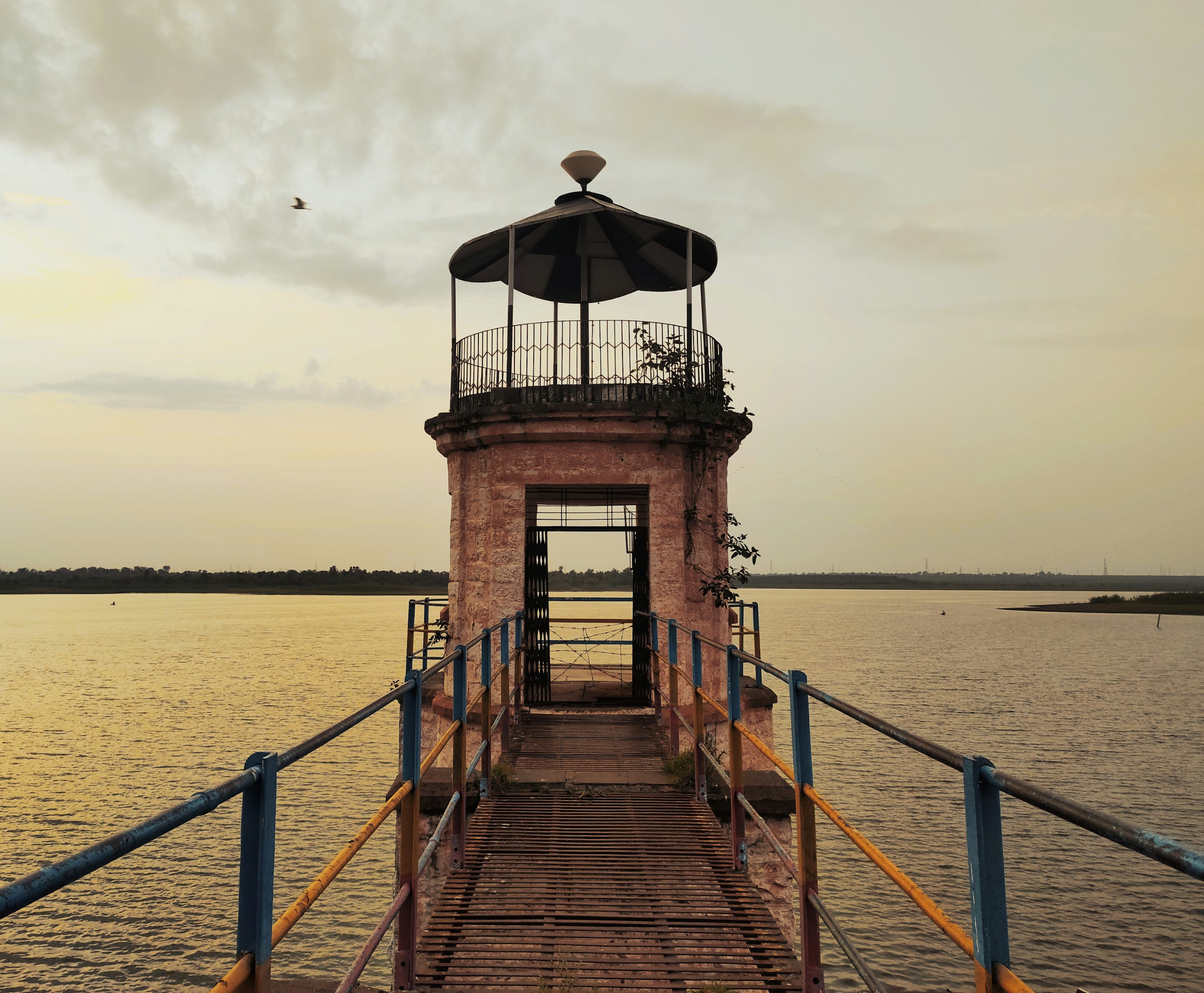 Metal railings along a coastal path in the Ria Formosa Natural Park